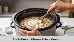 Sour cream and cream cheese stirred into tender chicken and mushrooms to make creamy chicken stroganoff sauce.